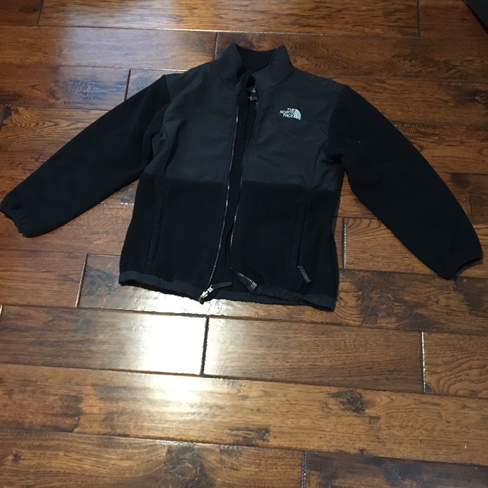 Girls black, medium sized North Face Jacket.